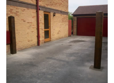 Timber posts installed ready for gates to be fitted Timber posts installed ready for gates to be fitted